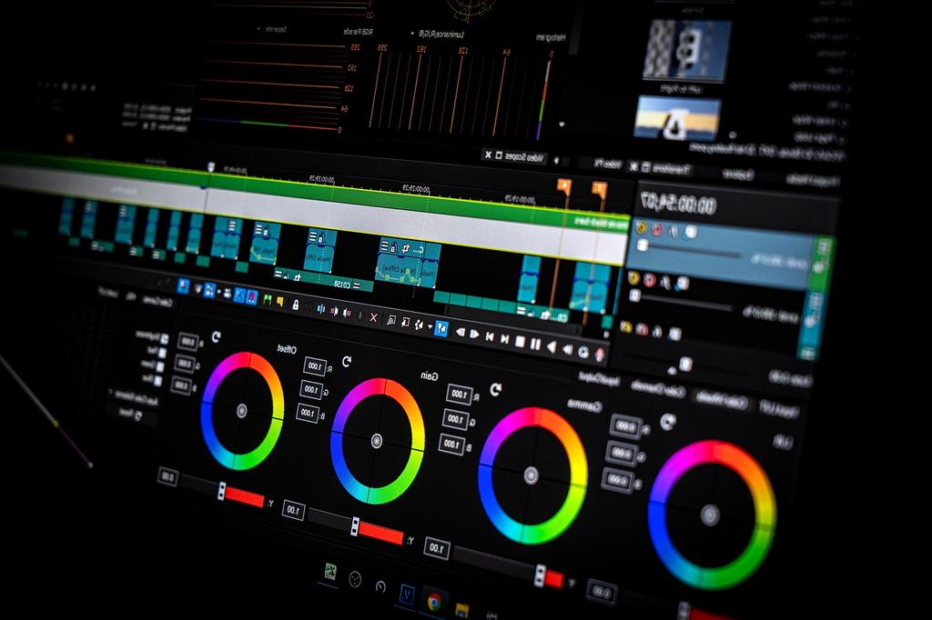 Modern digital workspace with multiple screens showing software applications